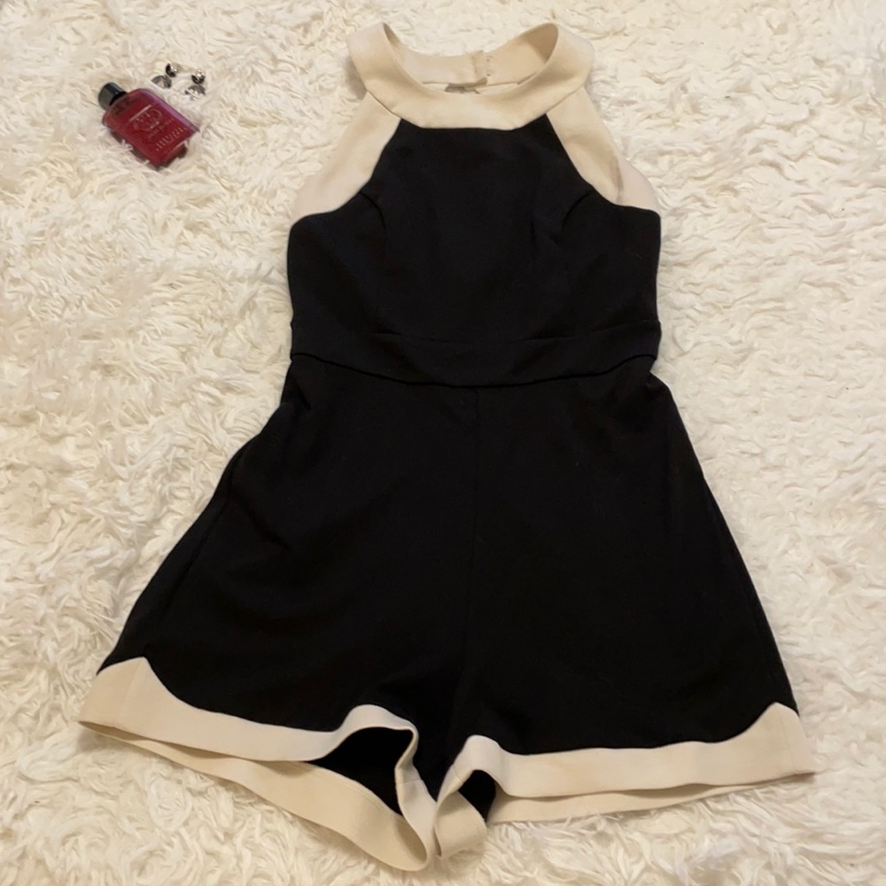 Bebe black romper size 0